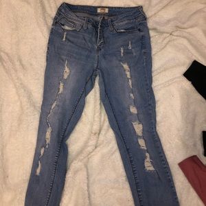 Ripped jeans with patches